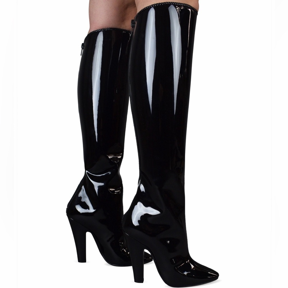 Saint Laurent “68” patent leather boots in black